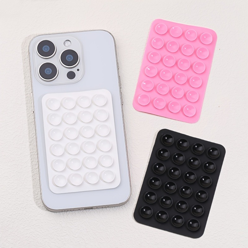 Phone Holder - シリコン製、吸盤式スマートフォンホルダー。多機能吸盤マット、壁掛けスタンド、滑り止め加工、片面接着剤付き、背面ステッカー。